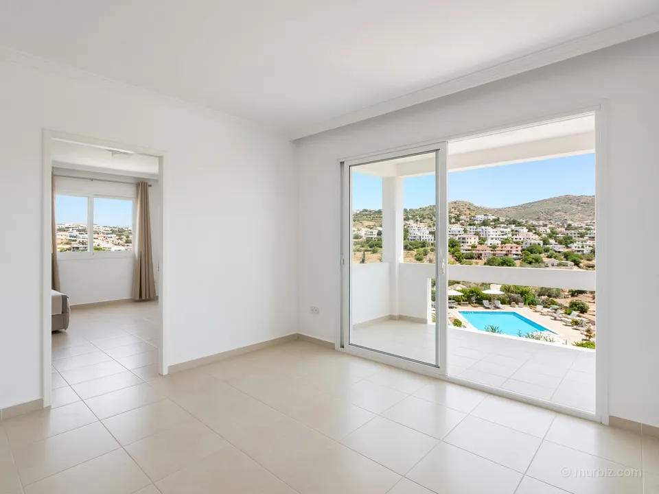 A one-bedroom apartment with a shared pool near Coral Bay