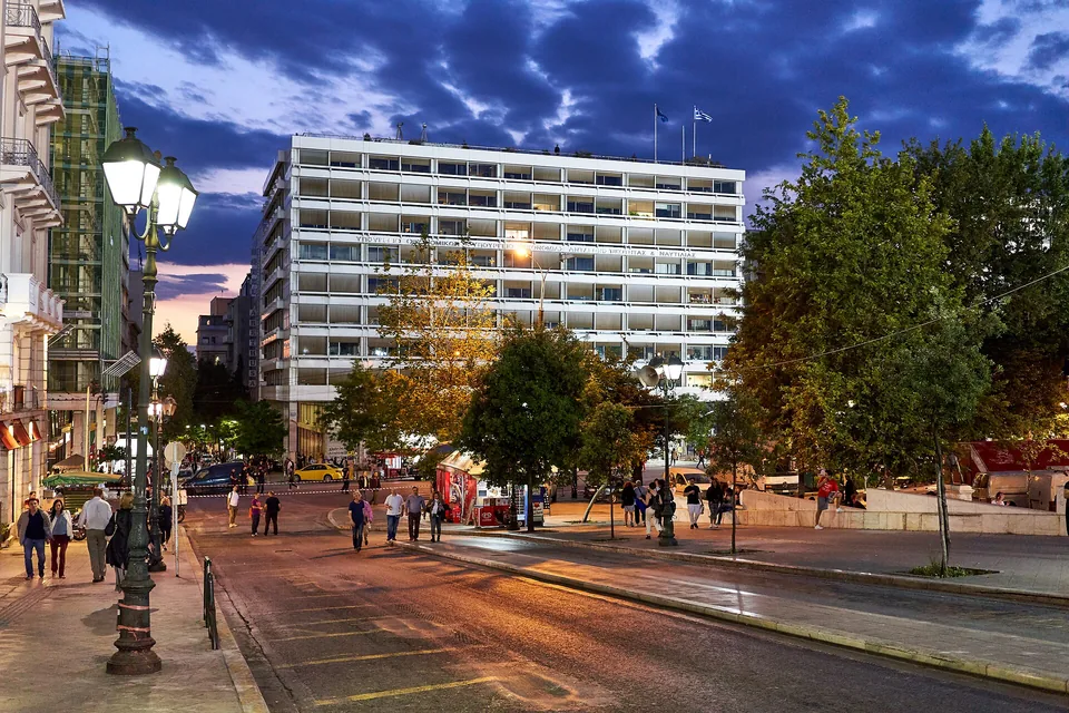 The Hellenic Ministry of Finance building on Syntagma Square in Athens at dusk